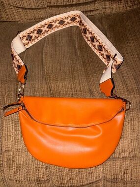 Orange Half Moon Crossbody Bag with Patterned Strap